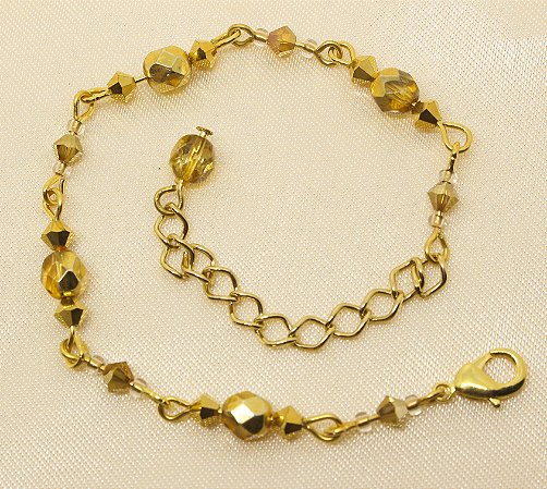 Pulseira de partezinhas com cristal