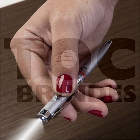 Caneta com laser e luz led, em aço, detalhes cromados, esferográfica azul, estojo em madeira com berço em espuma