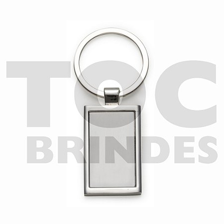 Chaveiro em aço brilhante, retangular, com chapa central fosca e argola alto brilho