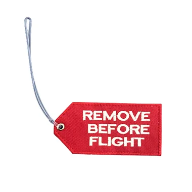 TAG DE MALA REMOVE BEFORE FLIGHT