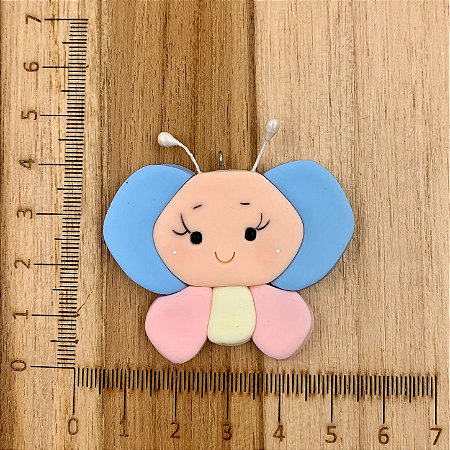 BISCUIT BORBOLETA ROSTO AZUL COM ROSA BEBÊ