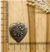 PINGENTE METAL CORAÇÃO EDELWEISS OURO VELHO