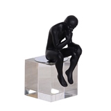 ESTATUETA DE RESINA E CRISTAL PRETA E TRANSPARENTE