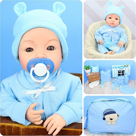 Boneca bebe reborn menino corpo de silicone roupa azul com babador