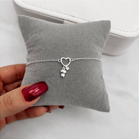 Pulseira entremeio coração vazado com pingentes menina e zircônia