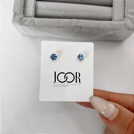 Brinco zircônia redonda embutida azul 6mm