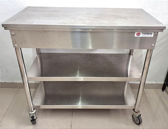 Mesa 100% Inox 1m Com Duas Prateleiras Inferiores Lisas e rodízio - Topema [Usada]