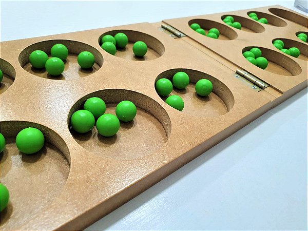 Mancala: antigo e versátil jogo africano de cálculo e estratégia