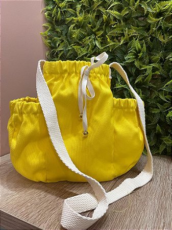 yellow drawstring bolsa