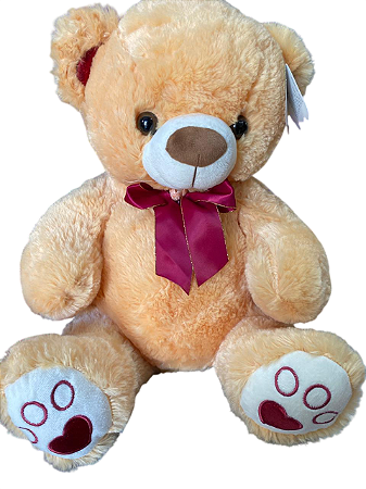 Urso com laço vermelho
