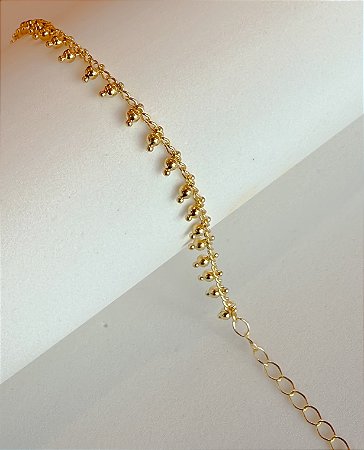 Pulseira bolinhas penduradas