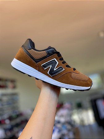 New balance preto e marrom best sale