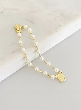 Pulseira Pai Nosso com pérola em banho de ouro 18k