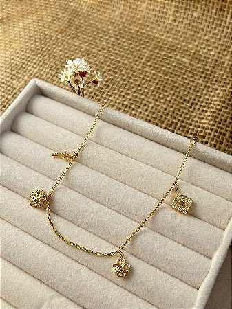PULSEIRA COM PINGENTES PENDENTES CRAVEJADOS EM ZIRCÔNIA BANHADA A OURO