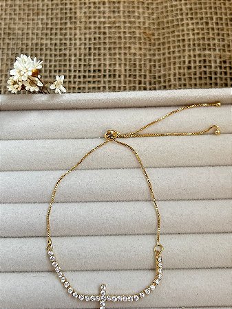 PULSEIRA RIVIERA CRUZ REGULAVEL BANHADA A OURO