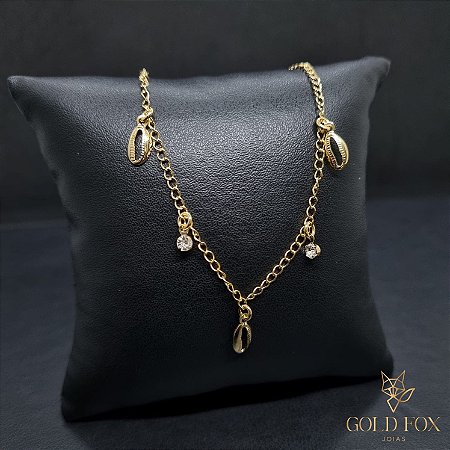 TORNOZELEIRA BÚZIOS E PONTO DE LUZ PENDURADOS - BANHADO A OURO 18K