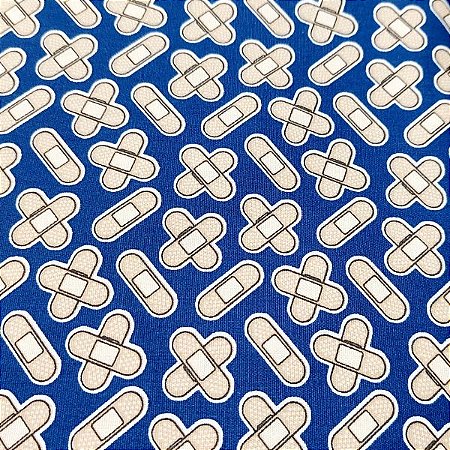 Tecido Tricoline para Patchwork com Estampa de Curativos em Fundo Azul Marinho