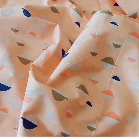 Tecido Tricoline para Patchwork com Estampa de Folhas Coloridas em Fundo Salmão