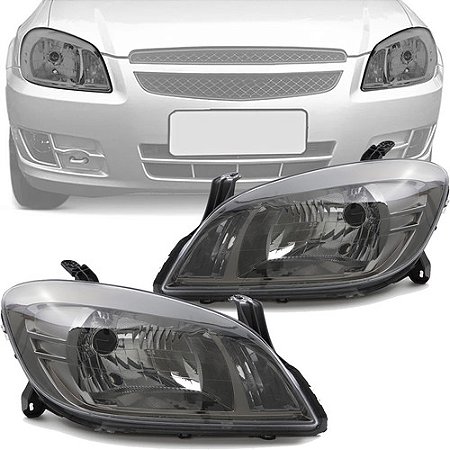 FAROL CELTA PRISMA 06/14 06 07 08 09 10 11 12 13 14 FUME NEGRO LADO ESQUERDO (MOTORISTA) 1414358 UNID.