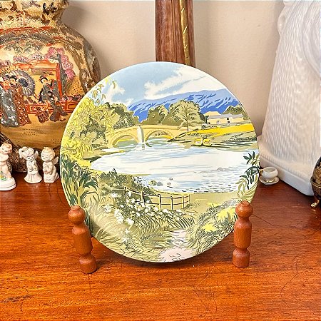 Prato decorativo em porcelana Schmidt.