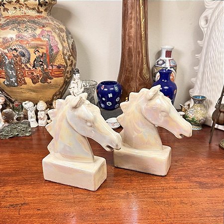 Par de esculturas cabeça de cavalo