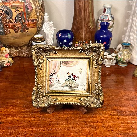 Antigo e pequeno quadro de parede