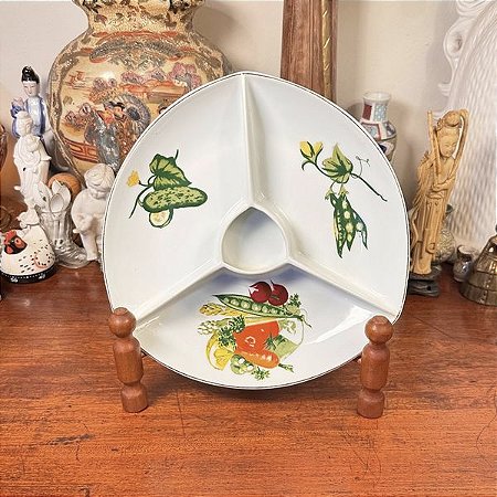 Antiga petisqueira em porcelana Schmidt.