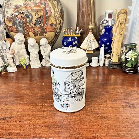 Pote porta algodões em antiga porcelana.