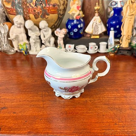 Elegante molheira em antiga porcelana Schmidt.