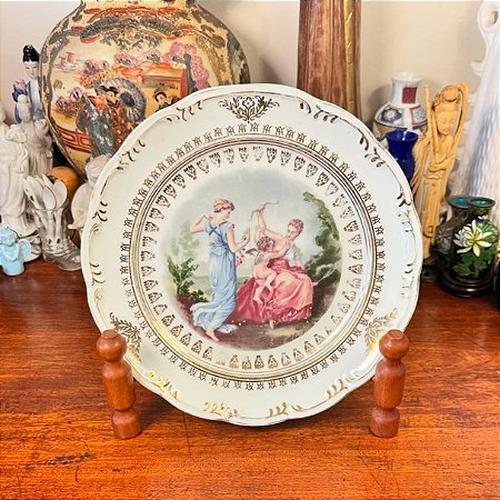 Deslumbrante prato decorativo em porcelana Schmidt.