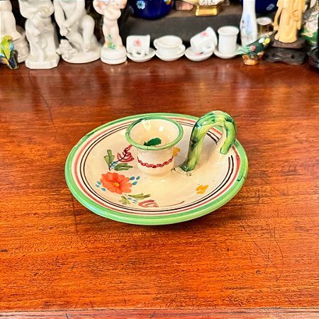 Elegante castiçal palmatória.