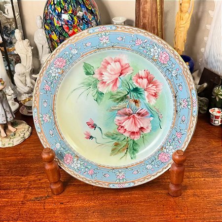 Prato decorativo em porcelana Schmidt.