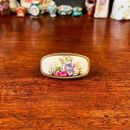 Antigo porta-batons em porcelana.