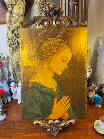 Quadro em reprodução gráfica da obra *Madona*.