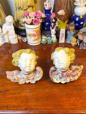 Par de anjinhos decorativo de parede.