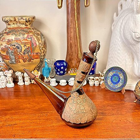 Garrafa de vidro âmbar espanhol.