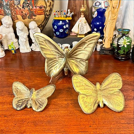 Trio de borboletas em metal para parede.