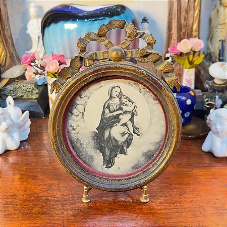 QUADRO NOSSA SENHORA COM MOLDURA TRABALHADA.