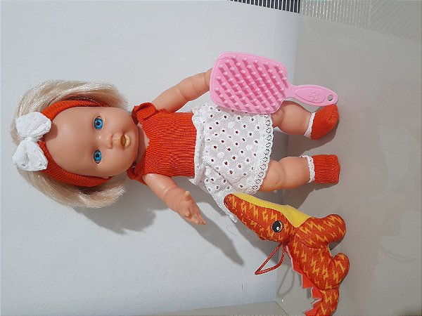 Boneca inteira borracha 28cm