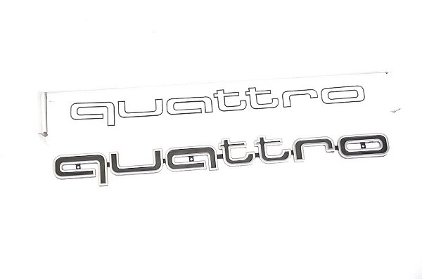 Emblema Quattro Grade Parachoque Audi RS