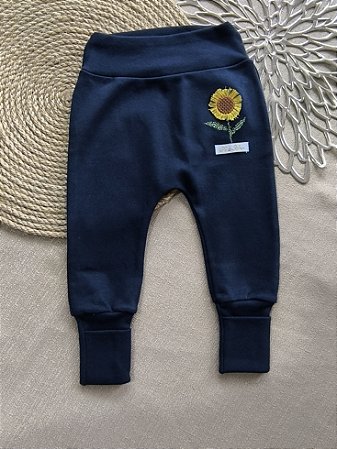 CALÇA BEBÊ COM BORDADO DE GIRASSOL