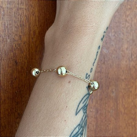 Pulseira feminina com bolas banho de ouro amarelo