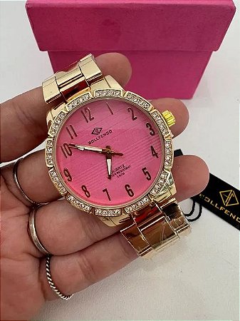 Relógio feminino com pulseira dourada e fundo rosa Bollfendo