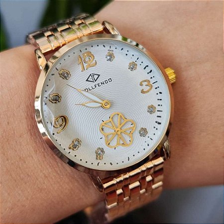 Relógio feminino Bollfendo fundo branco com pulseira dourada a prova da água
