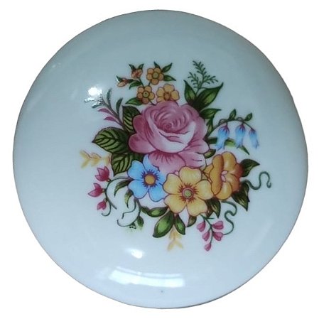 MAÇANETA OU  TRINCO DE PORCELANA BRANCA COM DESENHO DE FLOR E BASE LATÃO CROMADO;