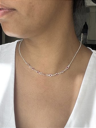 Schoker com ponto de luz rosa