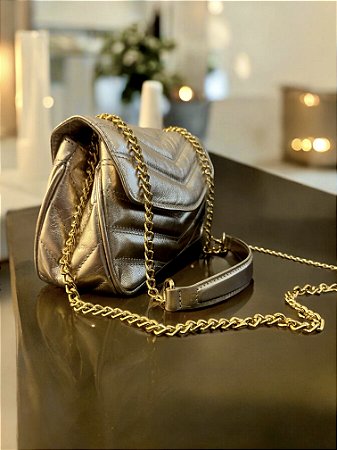 Bolsa matelassê ouro couro legítimo