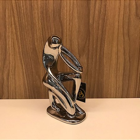 PEÇA DECORATIVA EM CERAMICA PESSOA PRATA