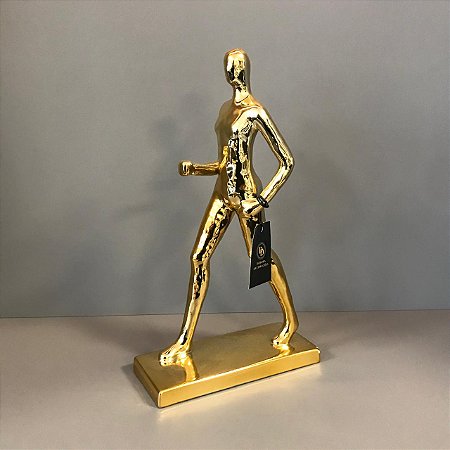 ESCULTURA DE CERAMICA HOMEM ANDANDO DOURADO