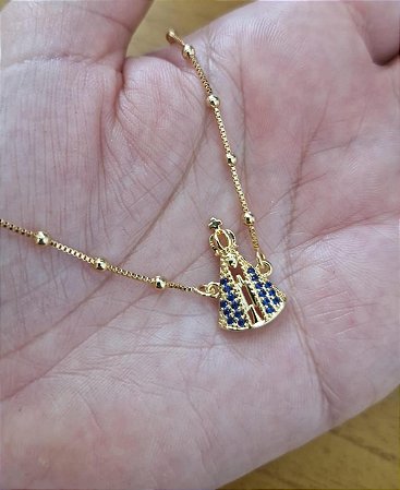 Pulseira feminina Nossa Senhora Aparecida banhada a ouro 18 k com 10 milésimos.